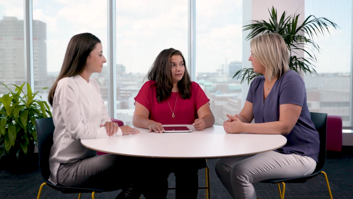 Snapshot from the Lifestyle and Relationships video of three women sitting at a table