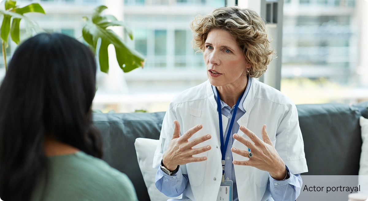 Actor portrayal of doctor with patient